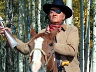 Valor de ley (1969) - Rooster Cogburn (John Wayne)
