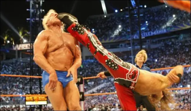 Shawn Michaels aplicando un Sweet Chin Music