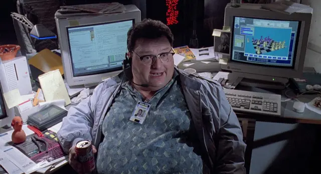 Wayne Knight como Dennis Nedry en Parque Jurásico (Jurassic Park) (1993)