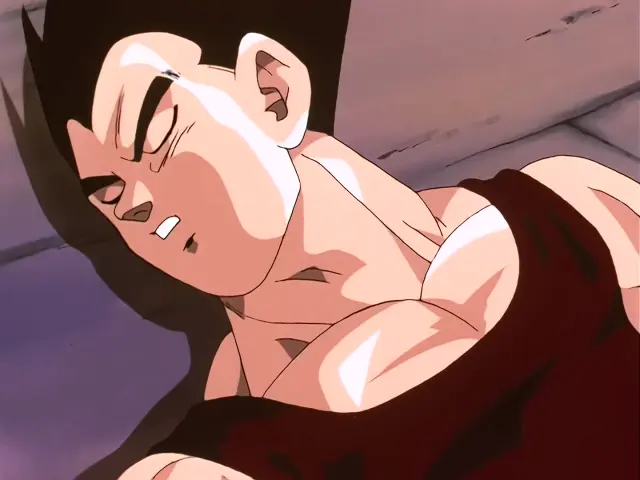 Goku Super Saiyan 4 mata a Baby con un Kame Hame Ha dirigido al sol